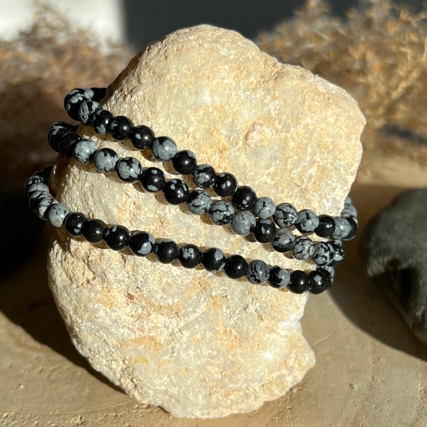 Schneeflocken Obsidian Kugel Armband 4mm 9SC
